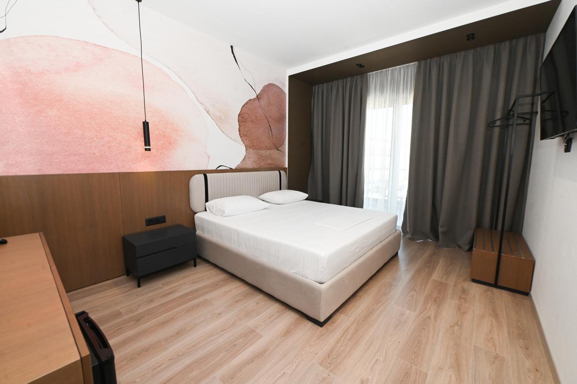 Monun Hotel Ксамил Екстериор снимка
