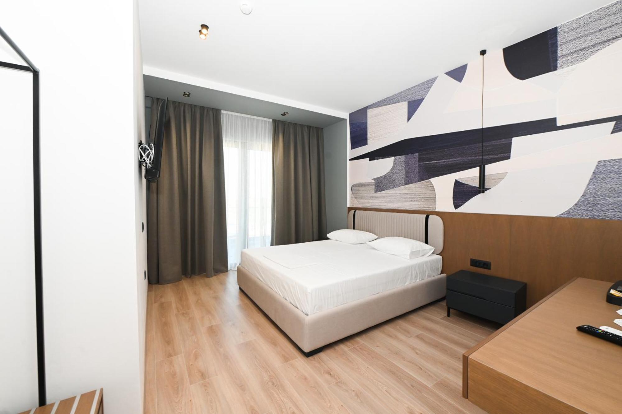 Monun Hotel Ксамил Екстериор снимка
