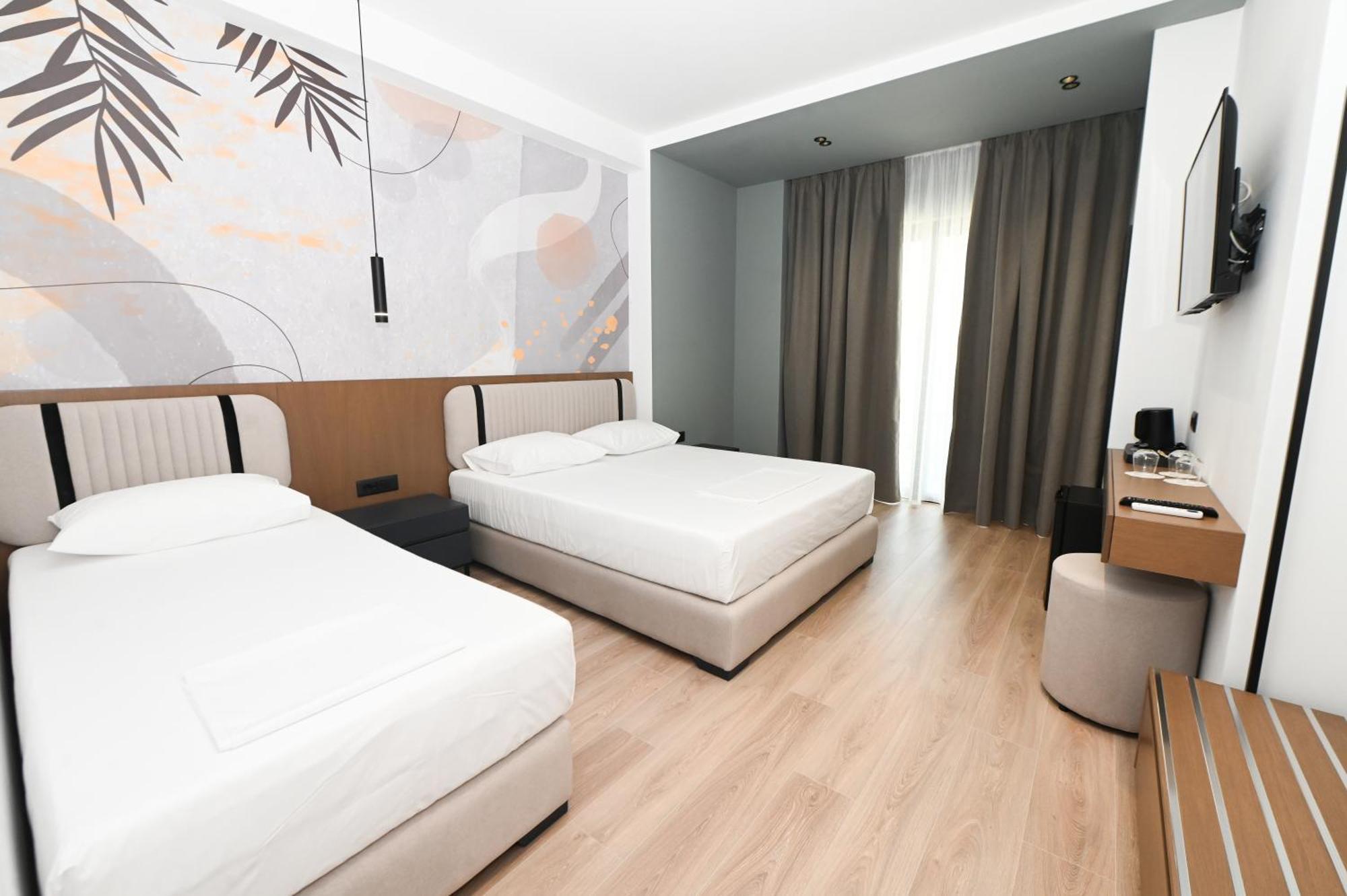 Monun Hotel Ксамил Екстериор снимка