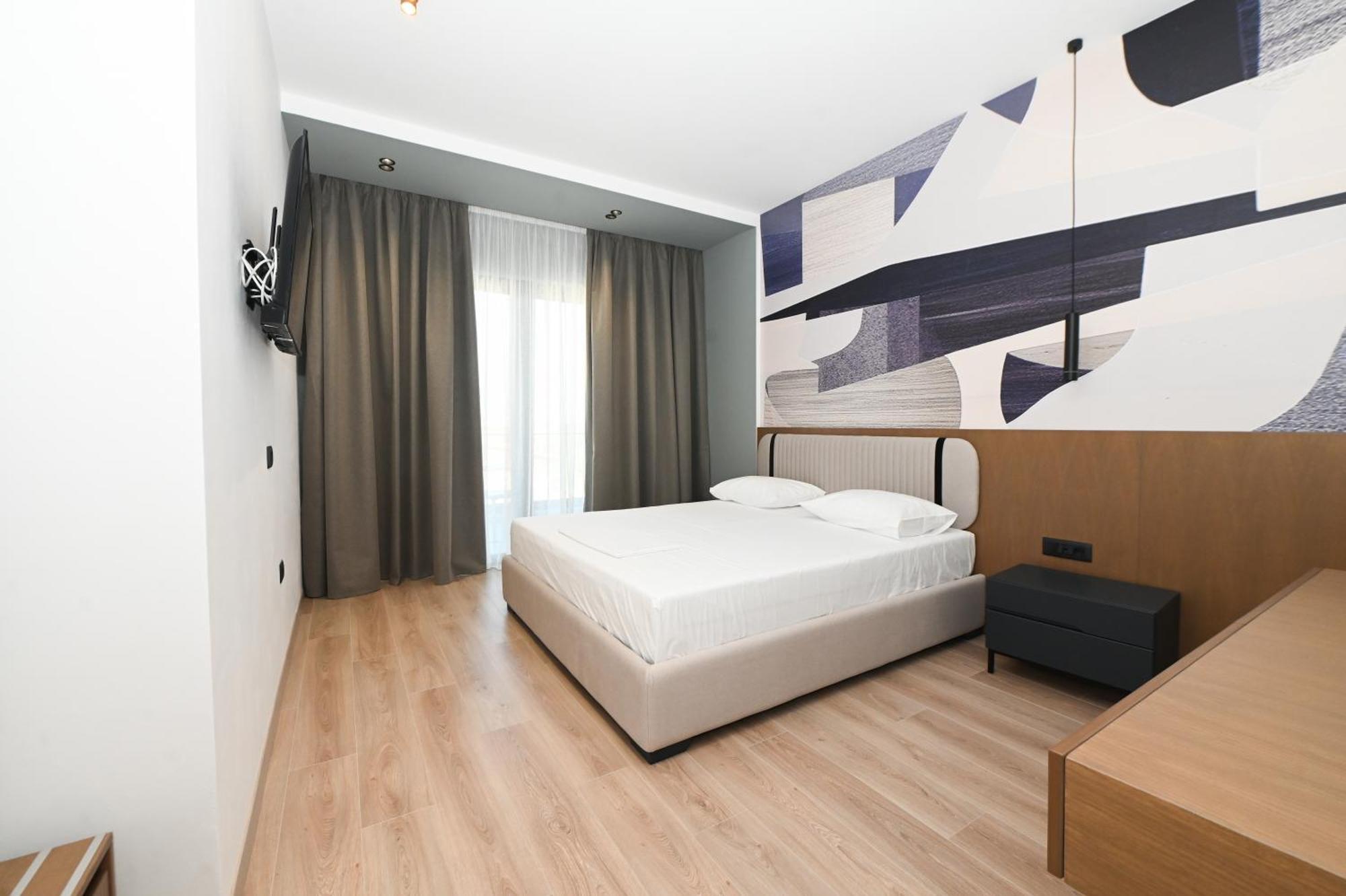Monun Hotel Ксамил Екстериор снимка