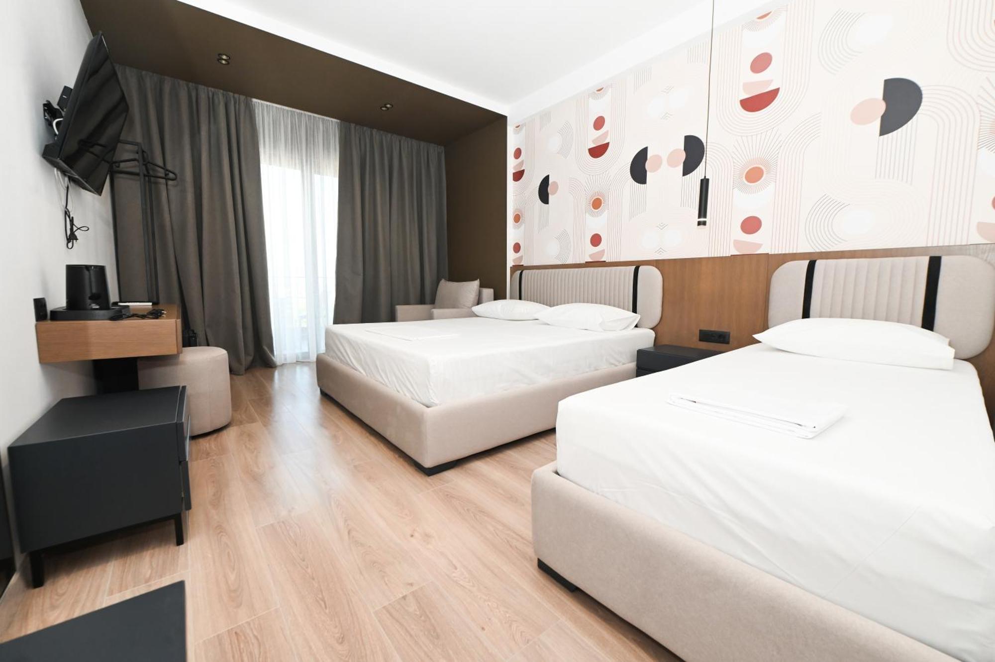 Monun Hotel Ксамил Екстериор снимка