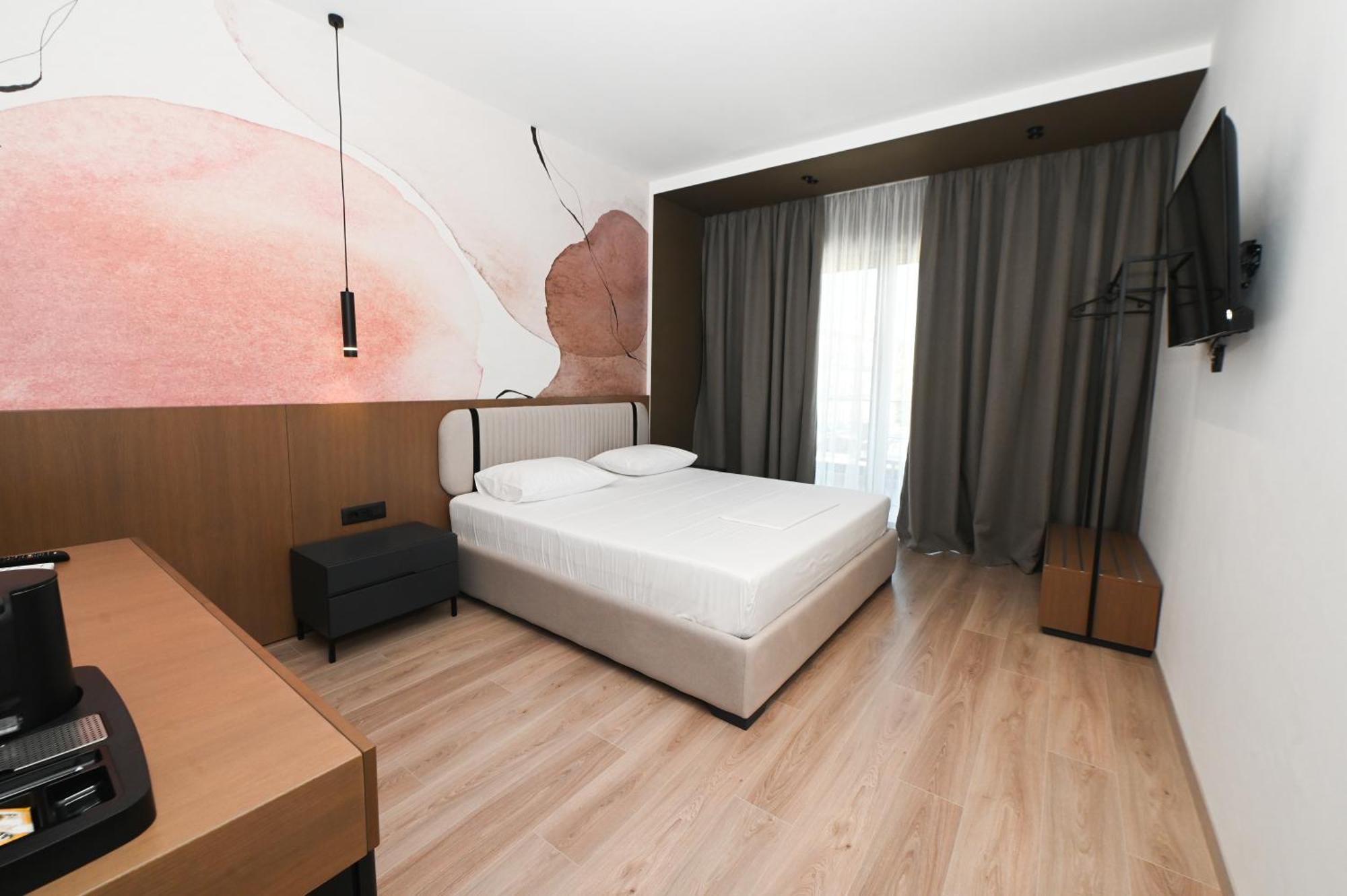Monun Hotel Ксамил Екстериор снимка